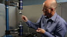 Argonne scientist Chris Benmore demonstrates his acoustic levitator, which could help to improve the efficiency and quality of pharmaceutical development.