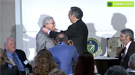 Secretary of Energy Steven Chu placing the Fermi award medal on award winner Dr. Mildred Dresselhaus 