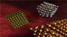 DNA linkers allow different kinds of nanoparticles to self-assemble and form relatively large-scale nanocomposite arrays.