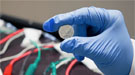 This prototype lithium ion battery, made in a Stanford lab, contains a silicon electrode protected with a coating of self-healing polymer.