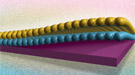 An artistic representation of atoms being layered onto surfaces using atomic layer deposition.