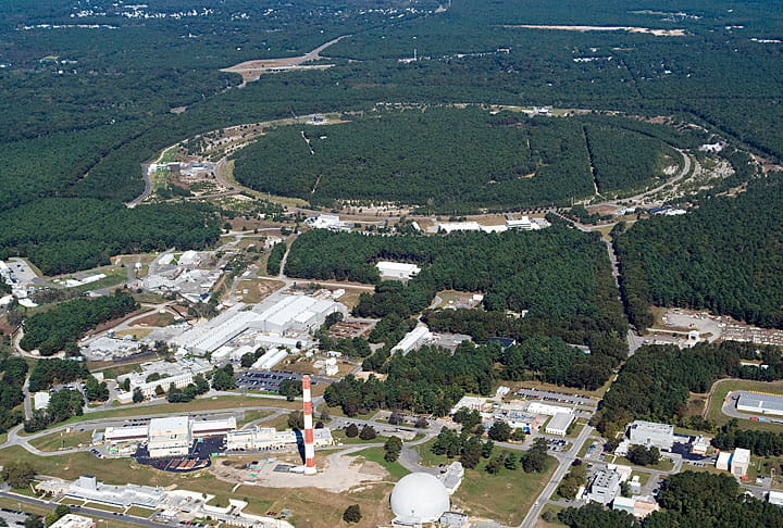 The Relativistic Heavy Ion Collider (RHIC) is actually two accelerators in one. Beams of ions travel around its 2.4-mile-circumference rings in opposite directions at nearly the speed of light, coming into collision at points where the rings cross.