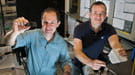 Two scientists working in the lab (Oleg Gang, left, and Mircea Cotlet)